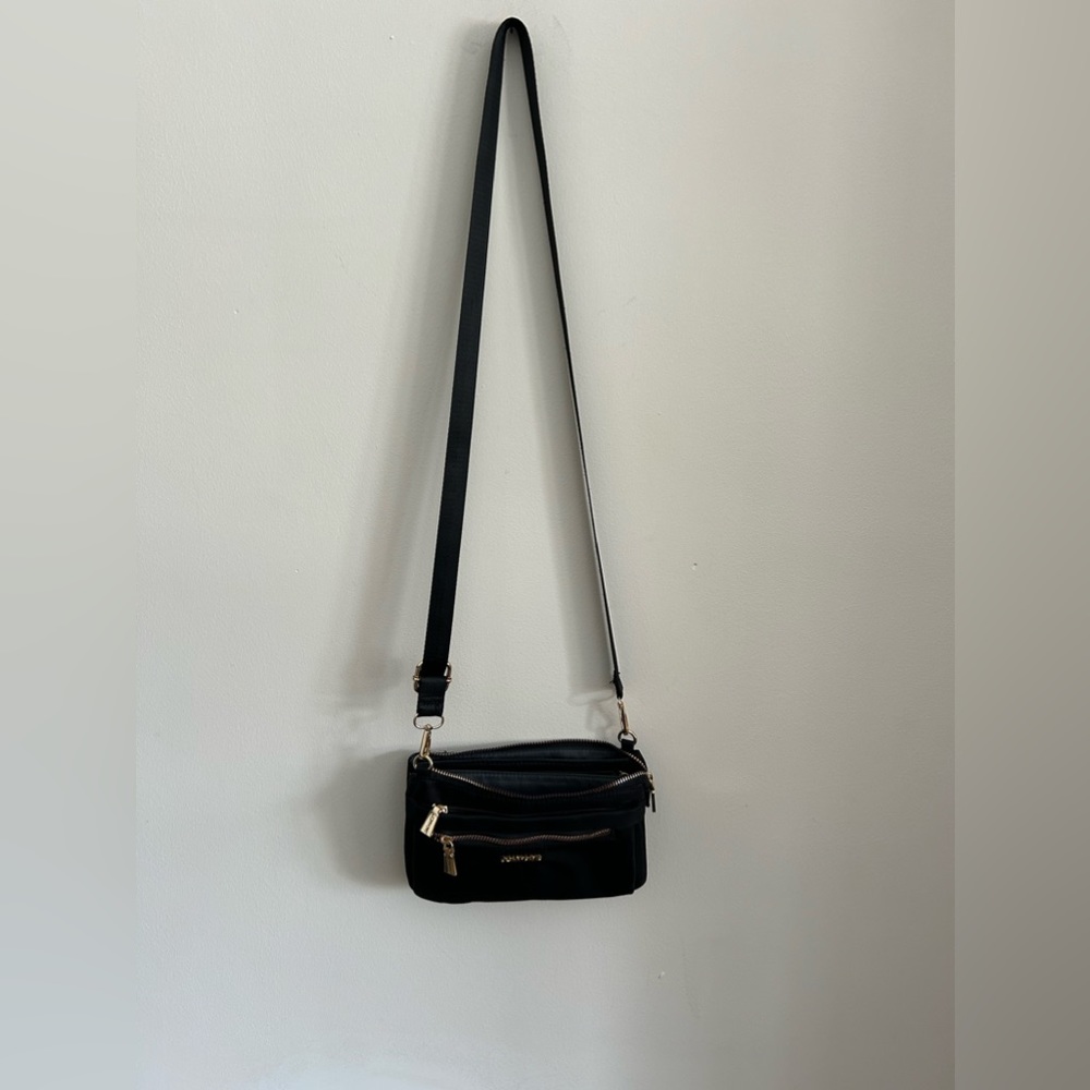 Joan and David Crossbody
